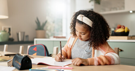 Book, homework and child writing in kitchen with studying for english test, scholarship and...