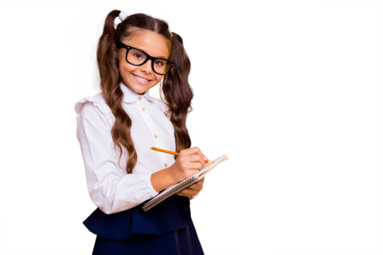 Essay about vacations and holiday! Portrait of beautiful, pretty, charming small girl writes story for lesson on literature and look at camera isolated on vivid yellow background with copy space