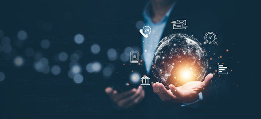 Communication and Contact us or Customer support hotline people connect. Hand using a laptop and touching on virtual screen contact icons, email and address, live chat with internet wifi.