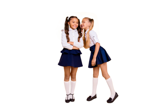 Full length, legs, body, size portrait of adorable, good-looking small girl isolated on bright yellow background bent to tell the secret of her friend