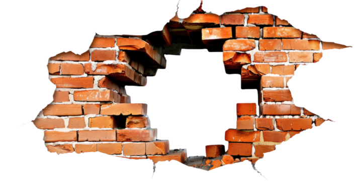 A large hole breaking through a red brick wall, creating a jagged, irregular opening. The bricks are cracked and displaced, showing damage and destruction.