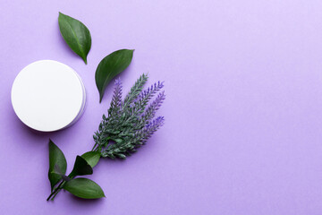 Organic cosmetic products with lavander flower and green leaves on color background. Copy space,...