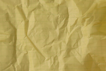 Crumbled yellow lined, clean paper texture