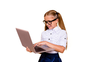 E-studying concept. Side profile close up photo portrait of cute lovely intelligent nice schoolkid watching video skype holding netbook ind hand doing homework isolated background