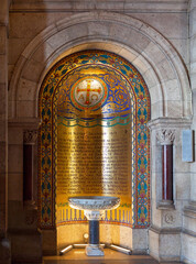 Holy water font in the Basilica of the Sacred Heart of Paris