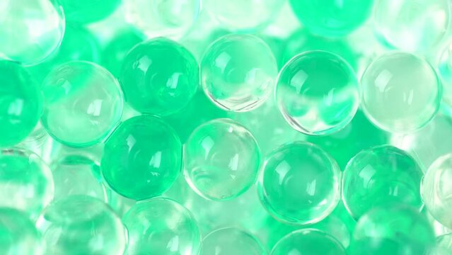 Green balls of bubble tea, macro. Mint bubbles