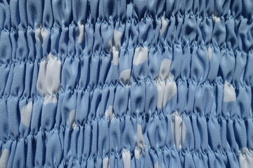 light blue and white rayon fabric with shirring from above