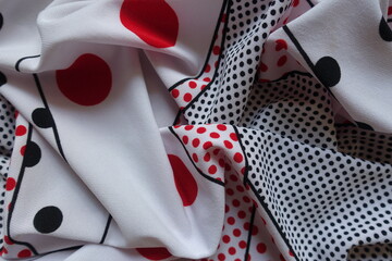 Jammed white, red and black spotted rayon fabric