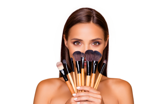 Close up portrait of brunette hair leisure lifestyle good-looking lovely pretty lady with her make up brushes naked shoulders she look at camera hide face isolated on pastel beige background