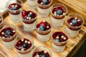 Panna Cotta vanilla  wiht strawberry berries famous Italian desserts ready to be served at parties.