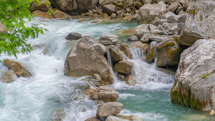 water flowing over rocks © OlenArt