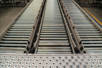 Obraz premium industrial conveyor belt. packing line in a logistics warehouse