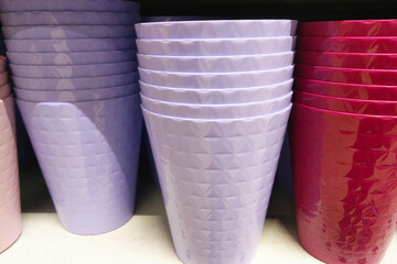 Neatly Stacked Pastel and Bright Colored Plastic Cups - Party Supplies, Tableware, and Kitchen Accessories
