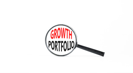 Growth portfolio symbol. Concept words Growth portfolio in beautiful magnifying glass. Beautiful white paper background. Business Growth portfolio concept. Copy space.
