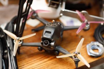 Fototapeta premium Workshop and repair production quadrocopter drones with parts stuff.