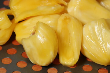 Fresh ripe jackfruit. Fresh sweet jackfruit segment ready for eat. Cutting jackfruit. Tropical fruit.