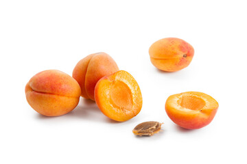Apricot fruit whole and half isolated on white background..