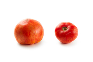 Two pink tomatoes isolated on white background with clipping path. .