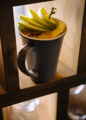 Warm spiced apple cider in a cozy mug