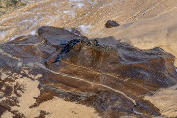 Kuilei Cliffs Beach Park, Diamond Head Crater, Honolulu Oahu Hawaii. Tuff is a type of rock made of volcanic ash ejected from a vent during a volcanic eruption. geogoly. 