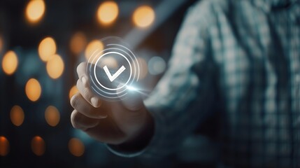 
A person is holding a glowing check mark on a screen. Concept of approval or satisfaction
