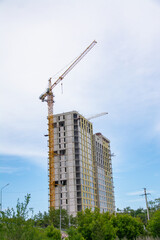 Fototapeta premium Constraction in the city. Building an apartment building. High quality photo