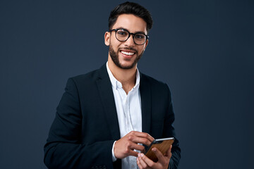 Business man, smartphone and portrait in studio with smile, happiness and app for company work....