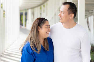 Lovely couple of Asian husband and wife, Happy Asian family with middle-aged spouse married couple staying together in positive expression, concept of Happy Family Day and Togetherness