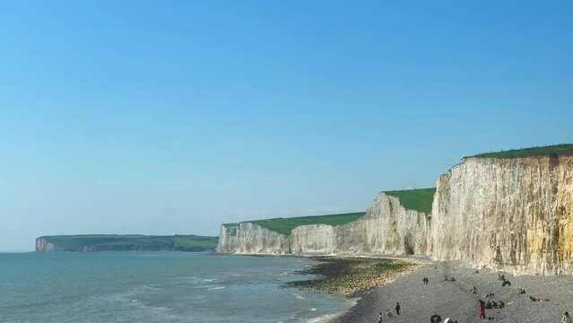 Seven Sisters chalk cliffs, Birling Gap near Eastbourne in East Sussex, famous, landmark, beach landscape, nature and sea coast, spring summer travel concept
