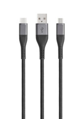 Black cable for charging and synchronization with Type - C, USB, Micro USB, Lightning connectors on a white background close-up