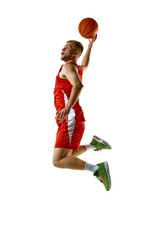 Athletic man, basketball player in red uniform jumping in mid-air, performing dynamic slam dunk against white studio background. Concept of professional sport, games, healthy lifestyle, tournament. © Lustre Art Group 