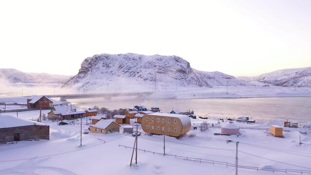 Teriberka village in winter season. Snowy landscape of Russian village on the North