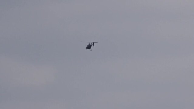 Helicopter Hovering Fly Over Flying flypast Low in the Distance