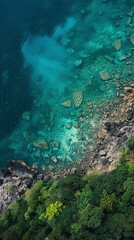 Obraz premium aerial view image of a tranquil ocean shore where the clear turquoise waters gently meet a rocky coastline. The vegetation is lush and green, indicative of a temper, generated with AI