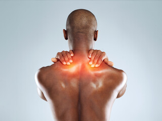 Back pain, stress or black man with injury, bruise or accident on white studio background. African person, guy or athlete with emergency, red highlight or physiotherapy for muscle tension or burnout - Powered by Adobe