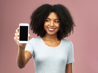 Phone screen, mockup and woman with smile in studio for advertising, information and digital...