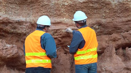 Geologists working in a mine,collecting rock samples for analysis,soil sampling for laboratory testing,exploring earth’s resources,unveiling geological mysteries