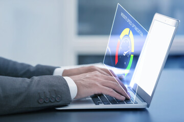 Website speed optimization. Man using laptop at table, closeup. Virtual screen over device
