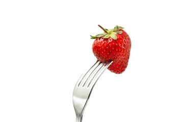 Strawberry on a fork isolated on white background with clipping path included