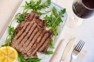 Grilled Steak with Arugula and Lemon