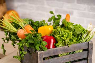 Image of fresh fruits and vegetables on the kitchen table