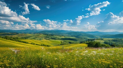 Summer landscape in a hilly region sunny day outdoors with clouds and clear blue sky