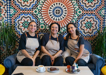 Three Moroccan sister women in their family Moroccan coffee business