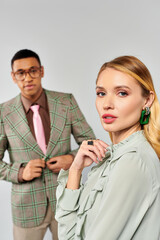 A man and a woman striking a pose together.