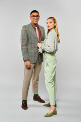 A man and woman embrace in a loving pose.