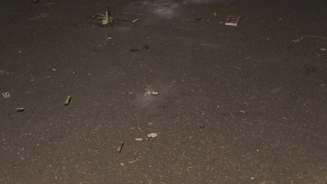bomb fireworks burning by kid during the Diwali festival celebration at night