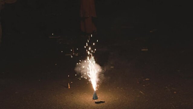 Flowerpots or indian Anaar fireworks during the Diwali festival celebration at night