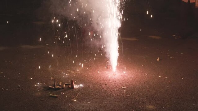 Flowerpots or indian Anaar fireworks during the Diwali festival celebration at night