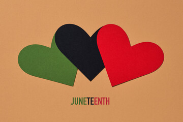 black liberation flag and text juneteenth