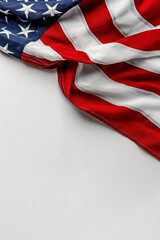 Fototapeta premium Folded American Flag Half Shown from a Corner on White Background, Memorial Day
